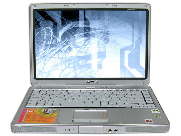 Portátil Compaq Presario V2615LA,
Procesador AMD Mobile Sempron 3000+ (1.8 GHz),
Memoria de 256MB DDR, Pantalla de 14