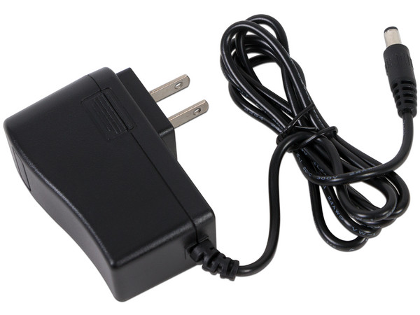 Fuente de poder regulada SAXXON PSU12015E de 12V, 1.5A para equipos de CCTV. Color Negro.