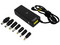 Adaptador de Corriente Universal Perfect Choice con puntas intercambiables y puerto USB de carga.